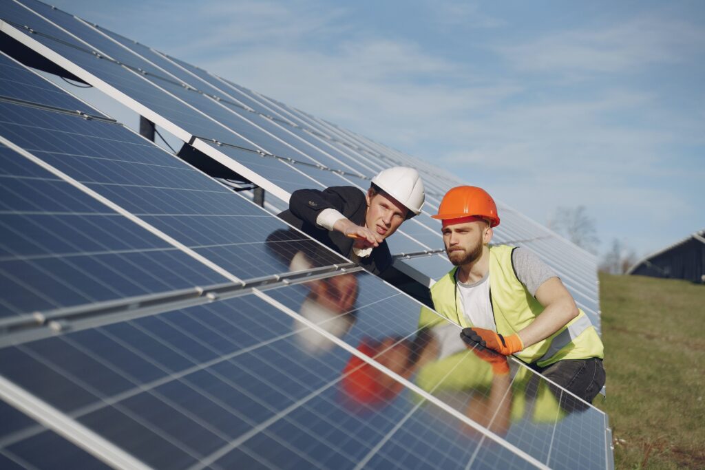 You should seek a professional inspection of your solar system if you observe any significant alterations. Alt Tag: Expert electricians examining the efficiency of solar panels.